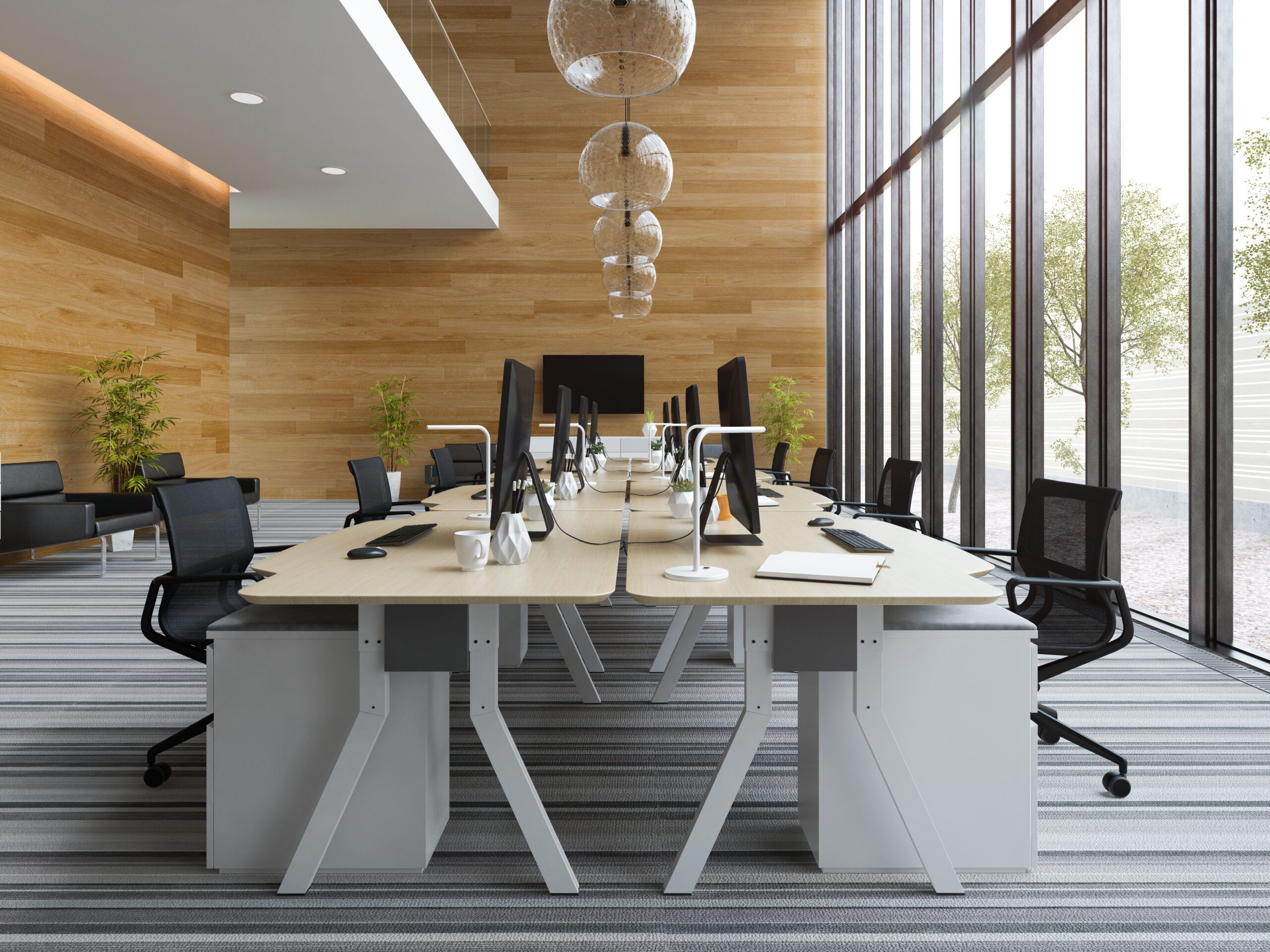 business office with bight light, desks and office chairs